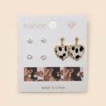 3-Pair Earring Set with Cow Print Heart Dangles and Studs