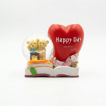 Teddy Bear Heart Snow Globe Figurine on Book Base