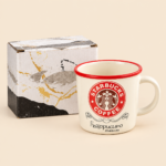 Cream Coffee Mug with Red Rim and Starbucks Logo